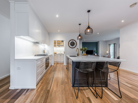 Kitchen with hanging pendant lights