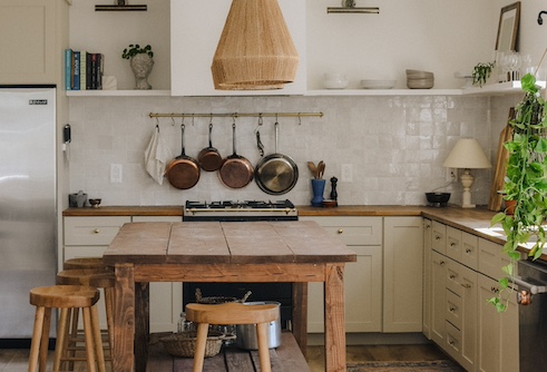 Farmhouse style kitchen with rustic wooden table