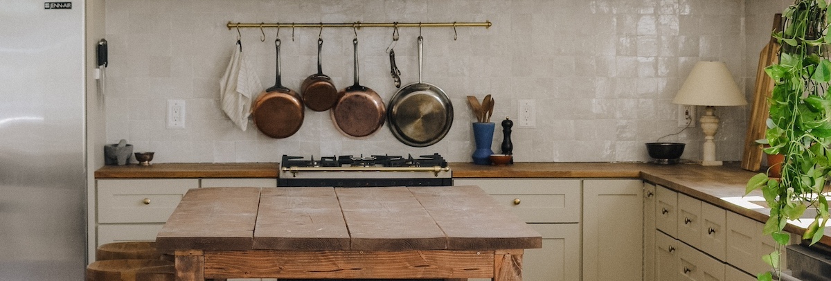 Farmhouse style kitchen with rustic wooden table