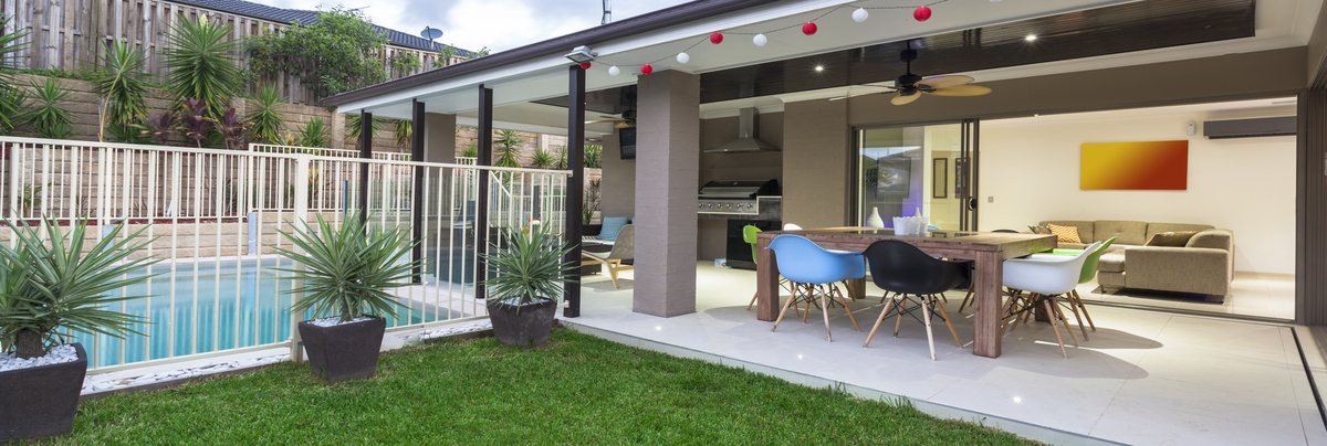 A outdoor living area that extends from inside.