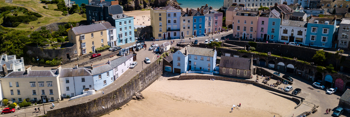 A row of cottages over looking a harbour