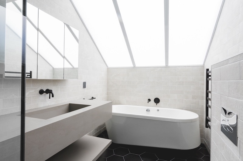 black hexagon tiles with modern tiled bathroom