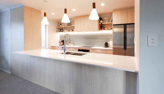 Kitchen with hanging pendant lights