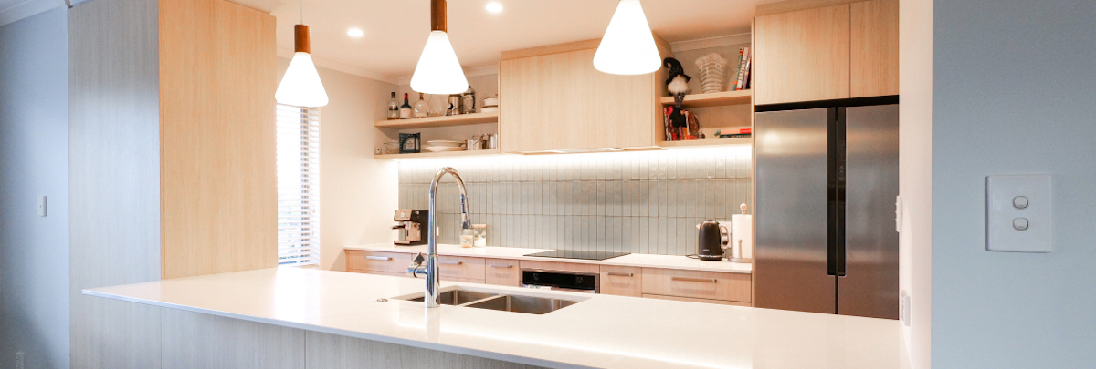 Kitchen with hanging pendant lights