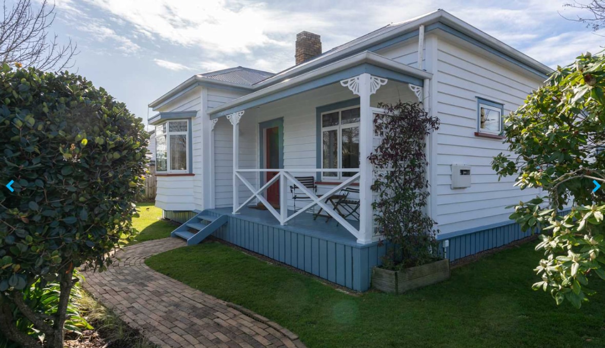 Weatherboard exterior with front porch 