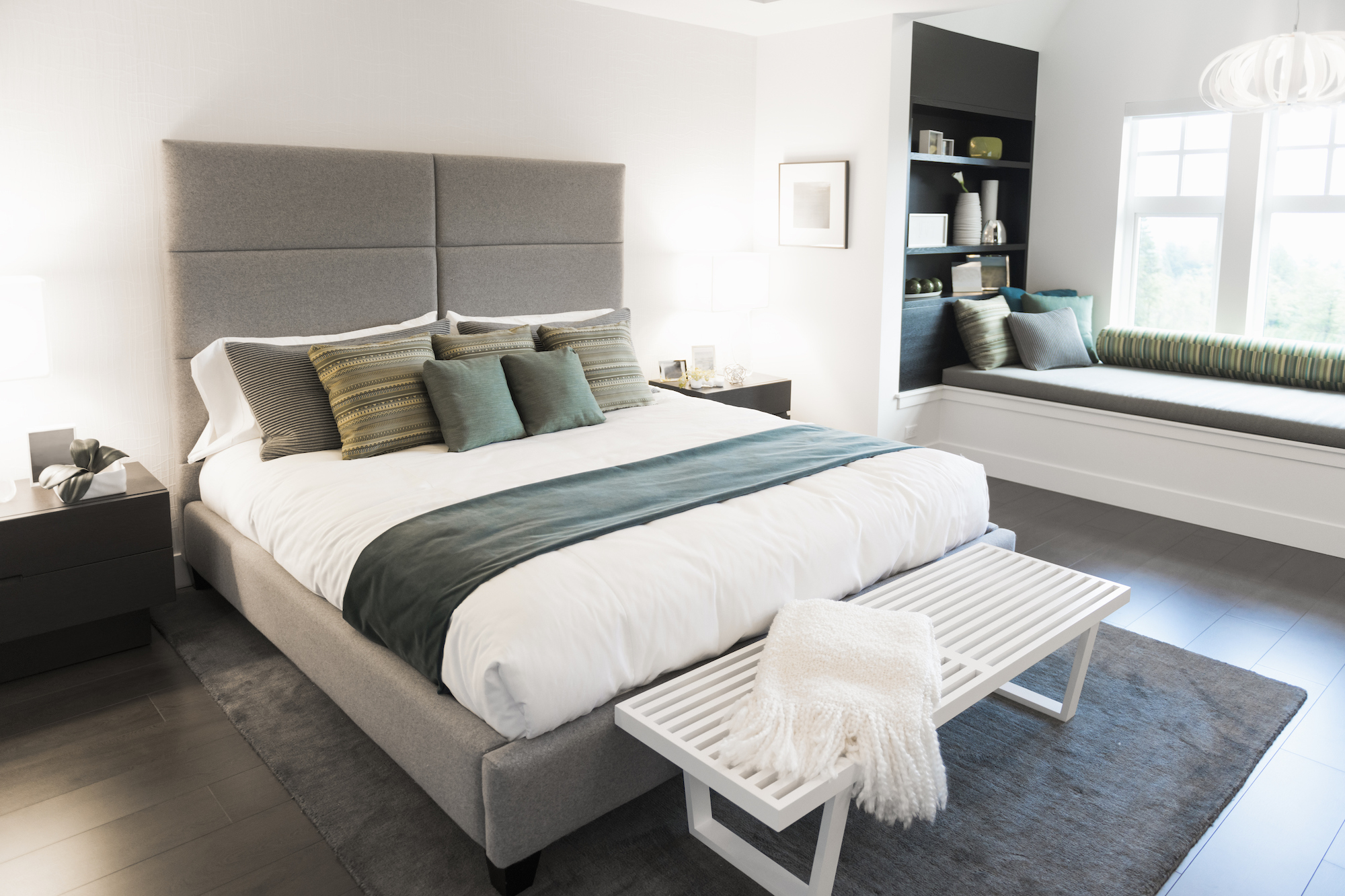 Bed with grey headboard