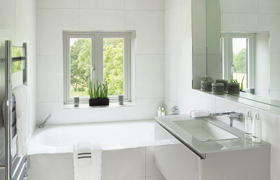 White bathroom with plants 