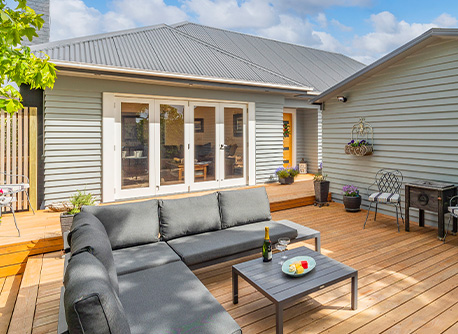 Outdoor house exterior with stained decking