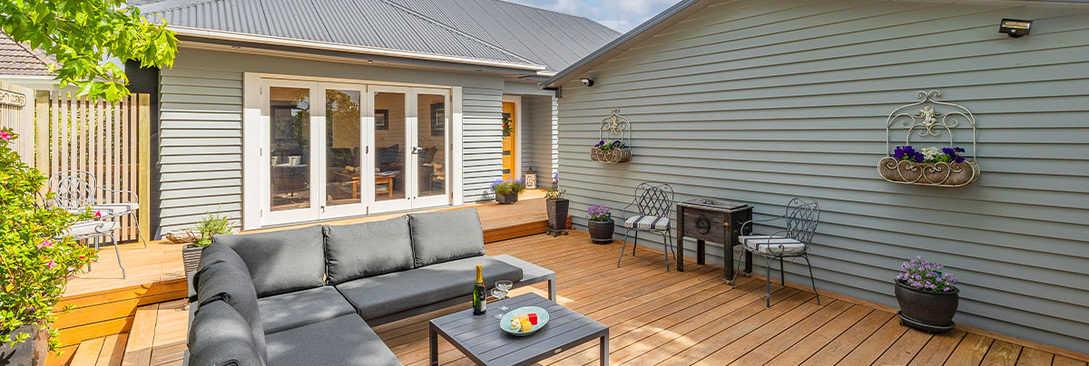 Outdoor house exterior with stained decking
