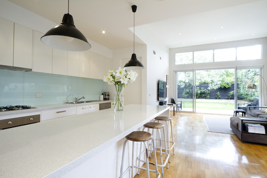 Kitchen with turquoise splashback