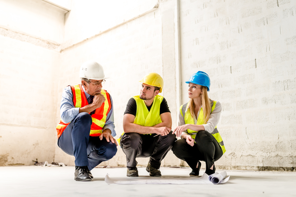 three people in high vis 