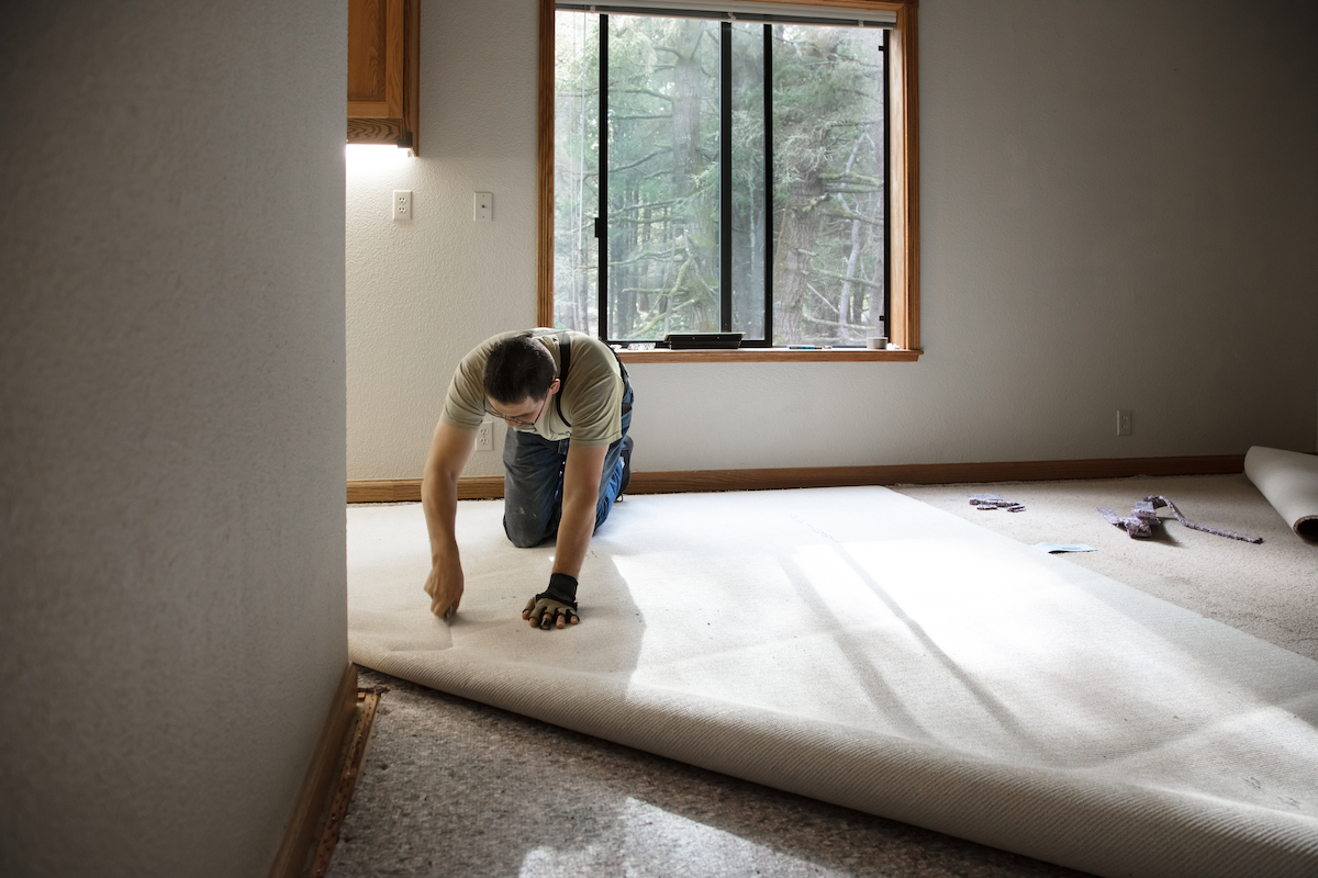 Laying carpet down