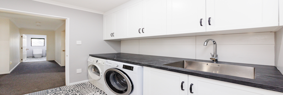 Stylish and functional laundry space with lots of storage