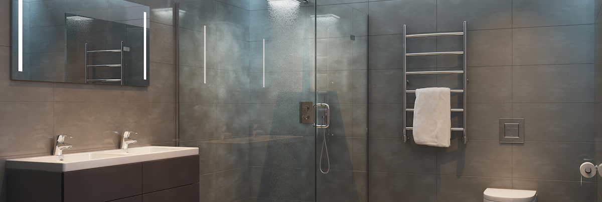 A modern style bathroom that is dimly lit