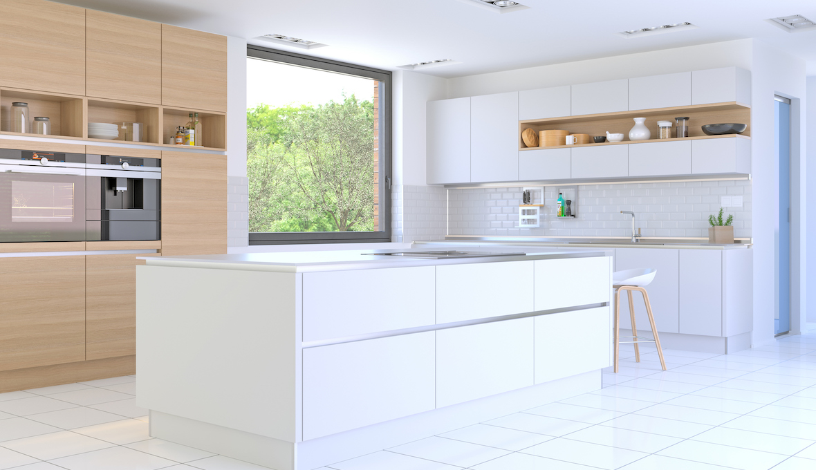 kitchen with big window, white kitchen island and wood cabinets