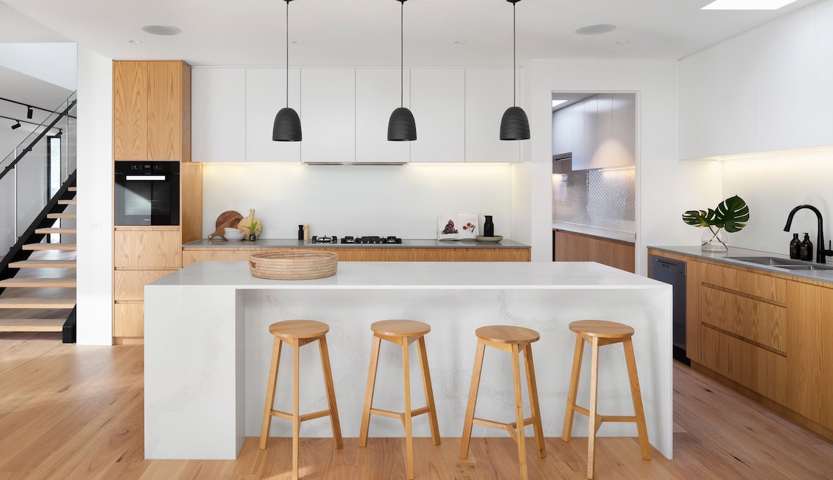 White kitchen island and pendant lighting highlight this Ashburton & Timaru kitchen renovation