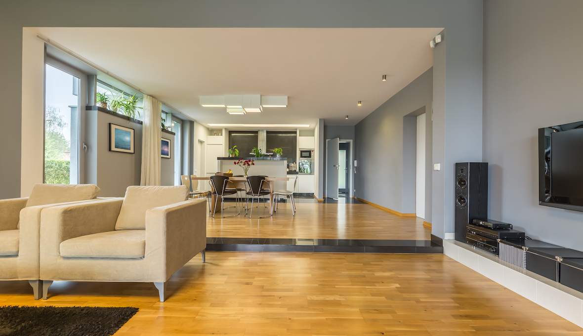 open-plan kitchen living room area with wooden floor