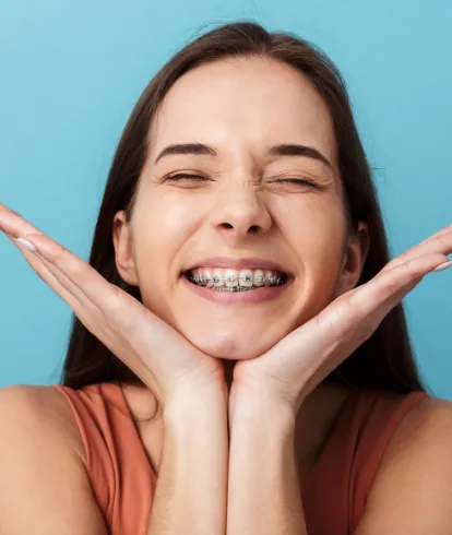 Women smiling with eyes closed
