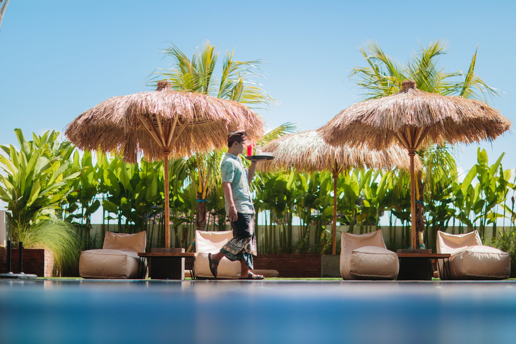 Tropical poolside at Mahogany Hotel Nusa Dua