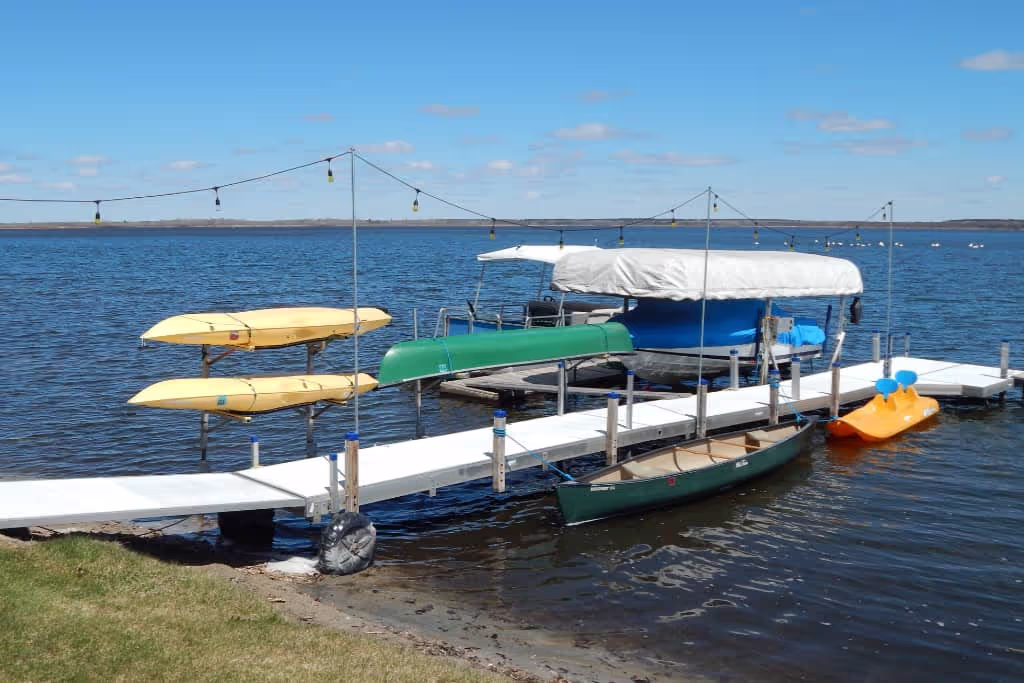 The dock with canoes and kayaks at Leech Lake Resort B&B