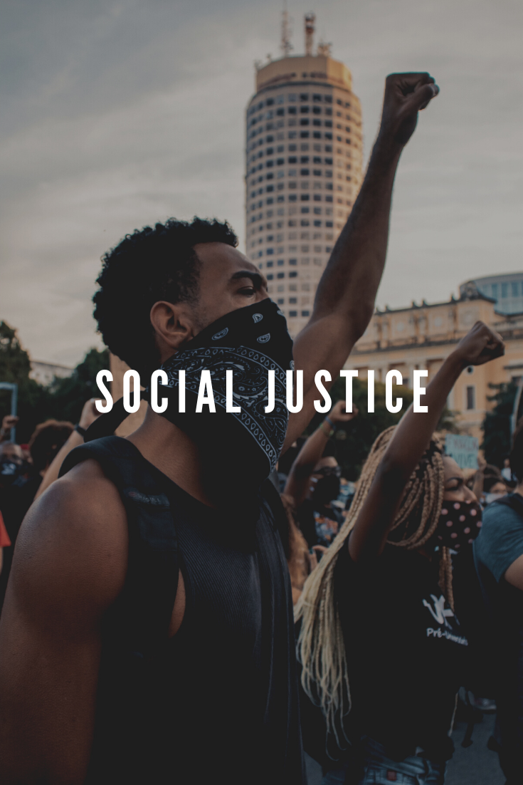 Black man with first in the air