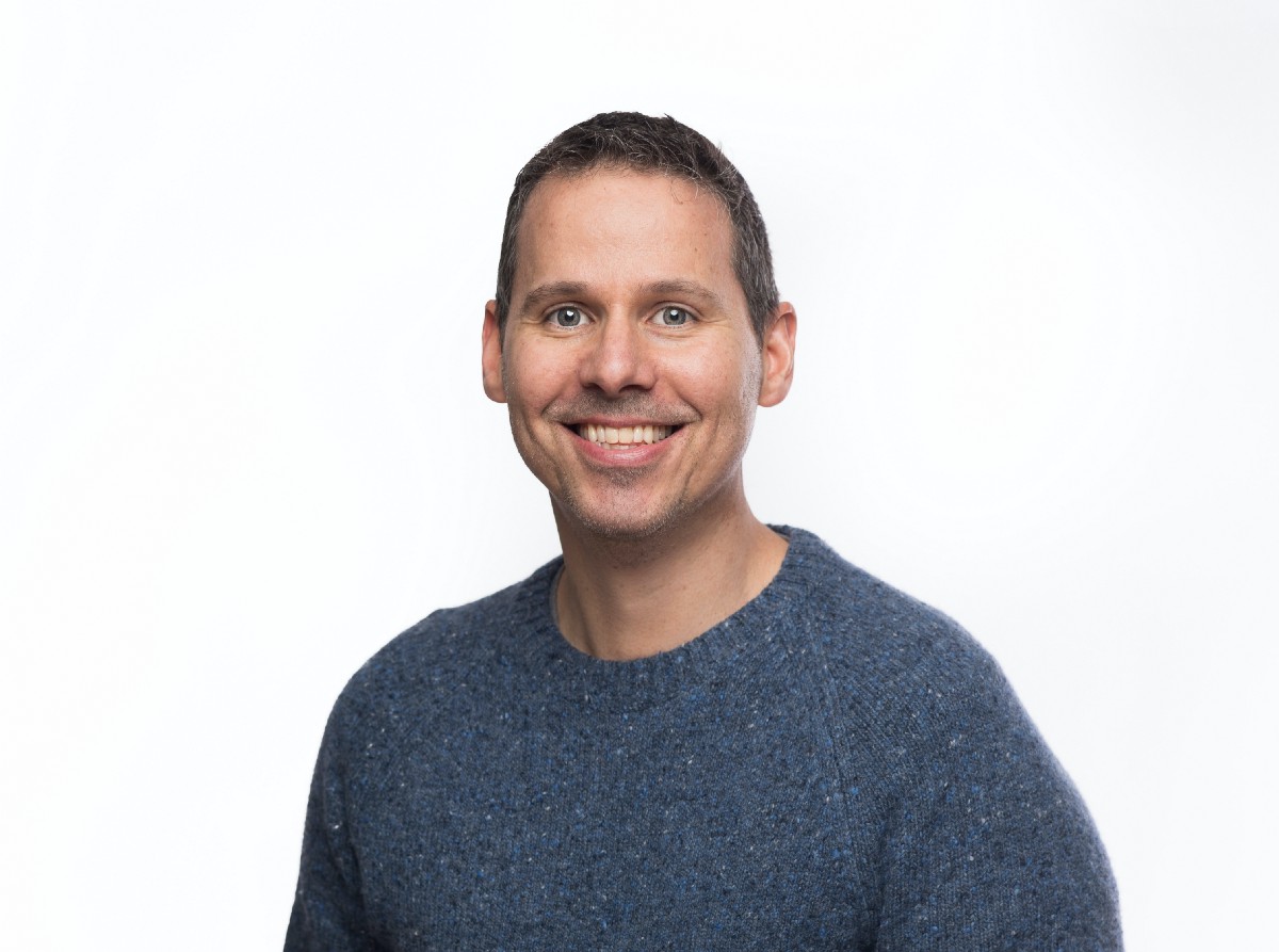 Headshot of a smiling Daniel Quick.