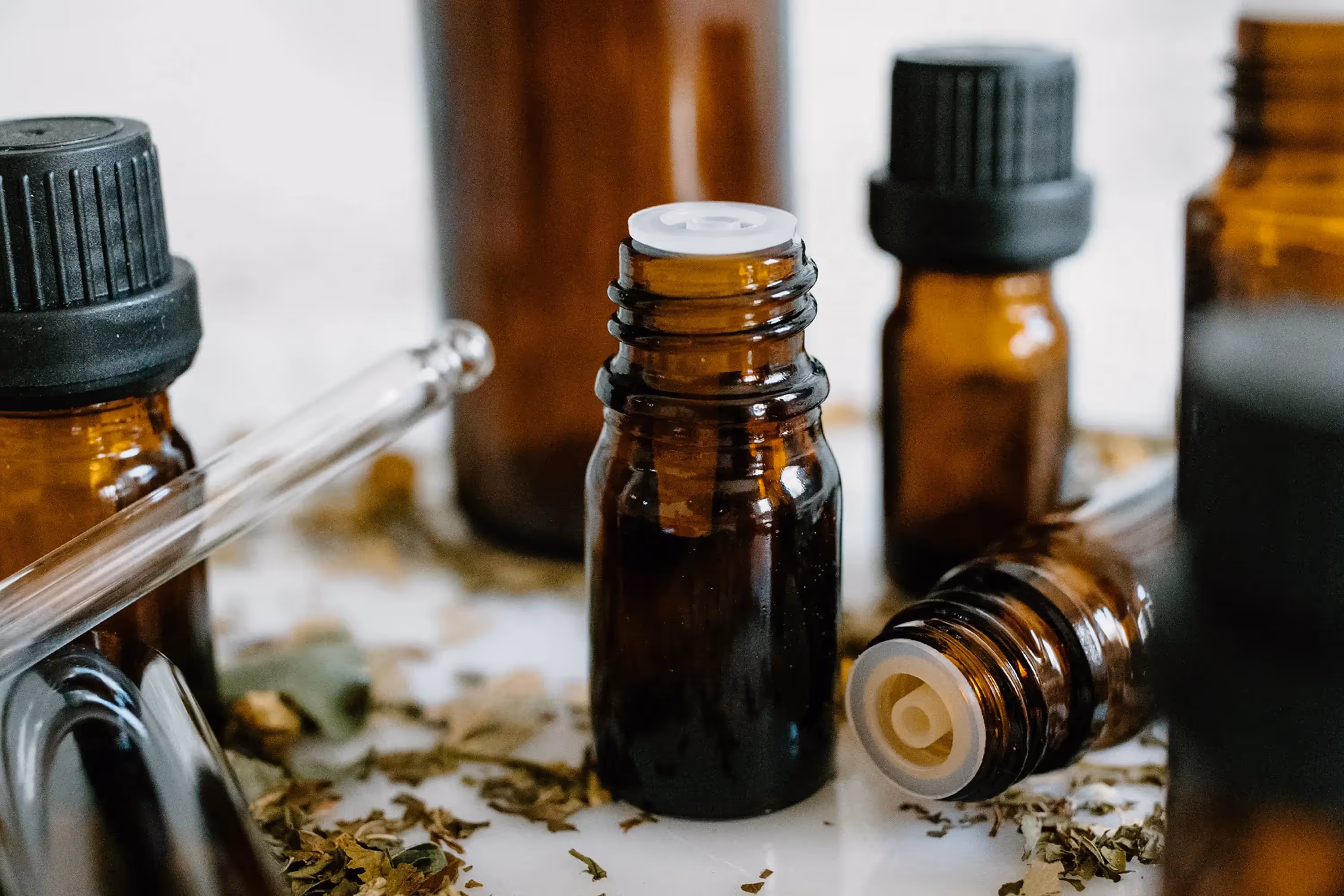 brown glass bottles of essential oil