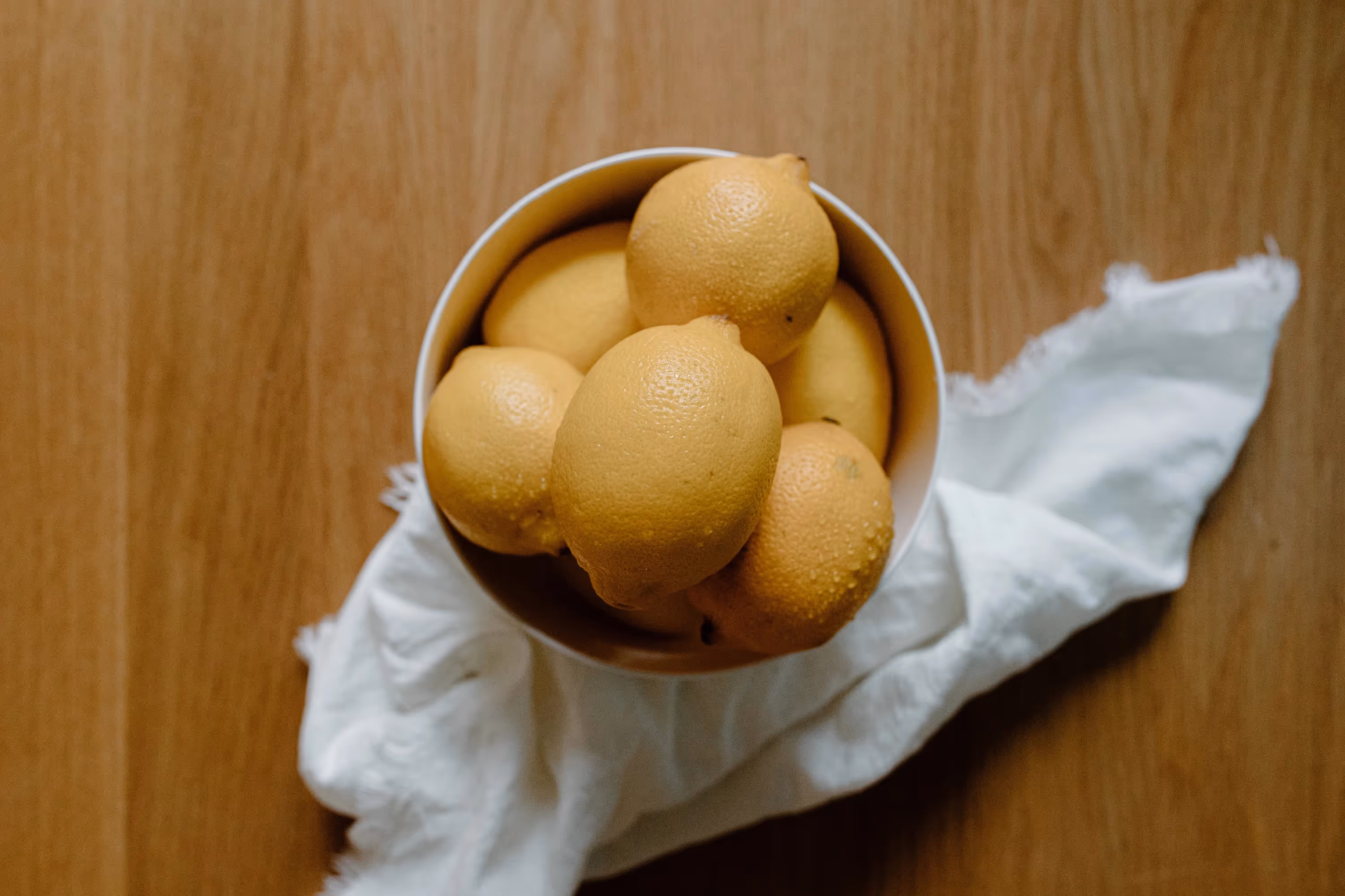a small bowl of lemons