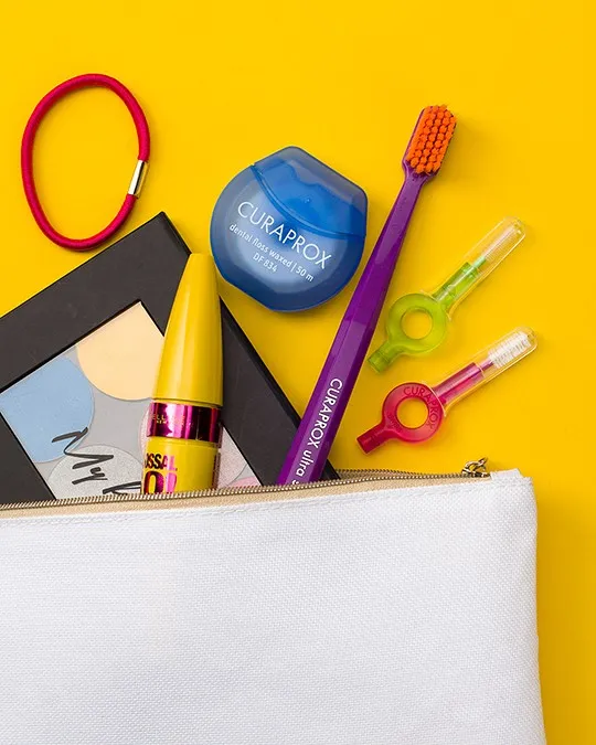 povoscena zobna nitka curaprox