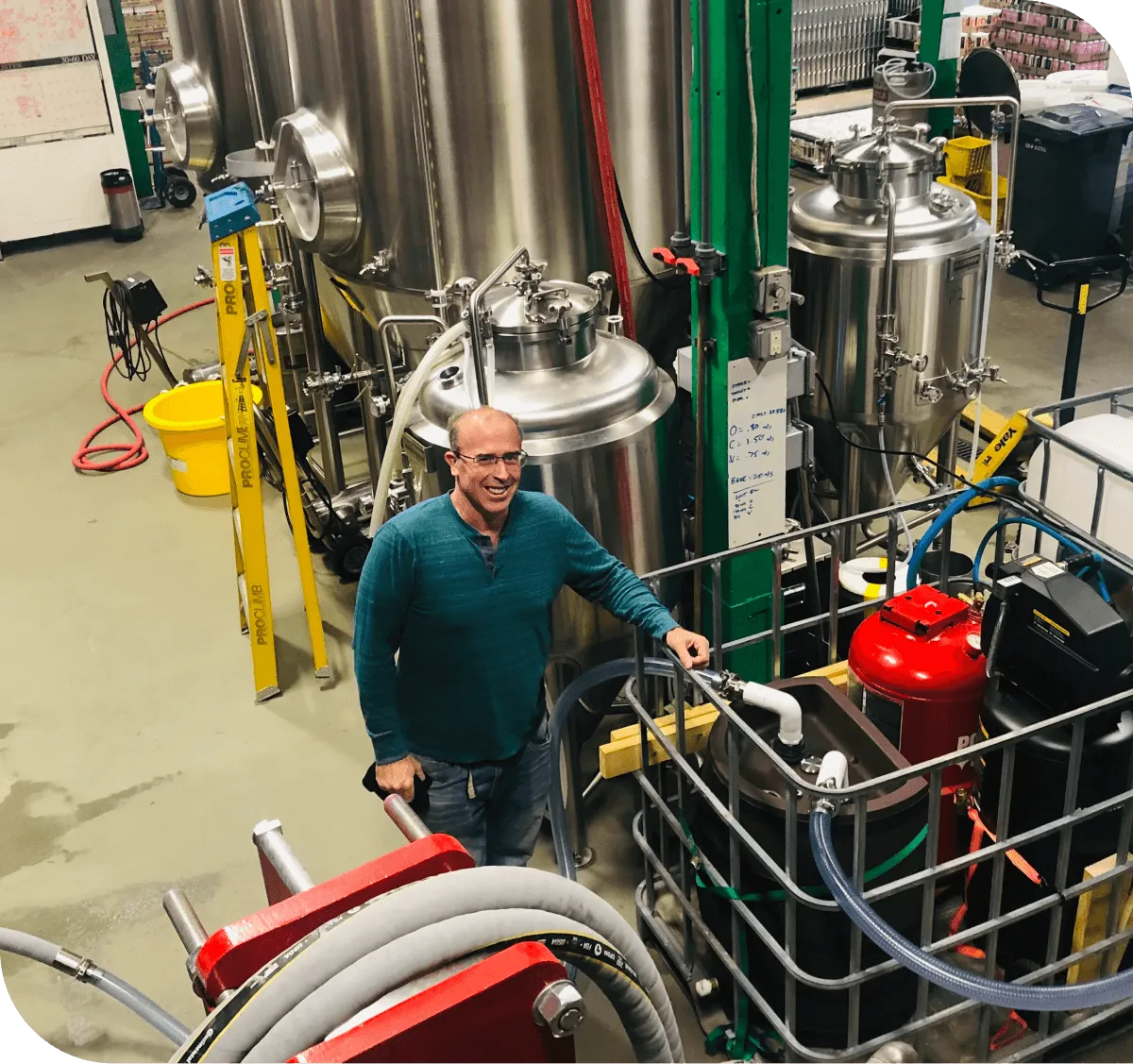 algae machine and man in brewery