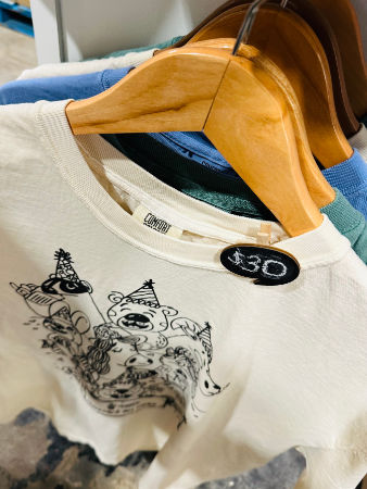 white tshirt with tin whistle 30th birthday characters