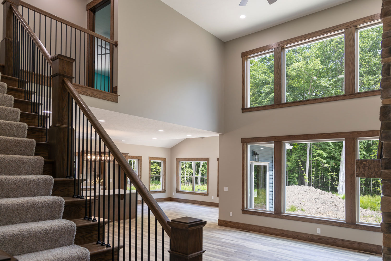 Set against a peaceful wooded backdrop, this four-bedroom, two-and-a-half-bath home blends timeless character with bright, open living. 