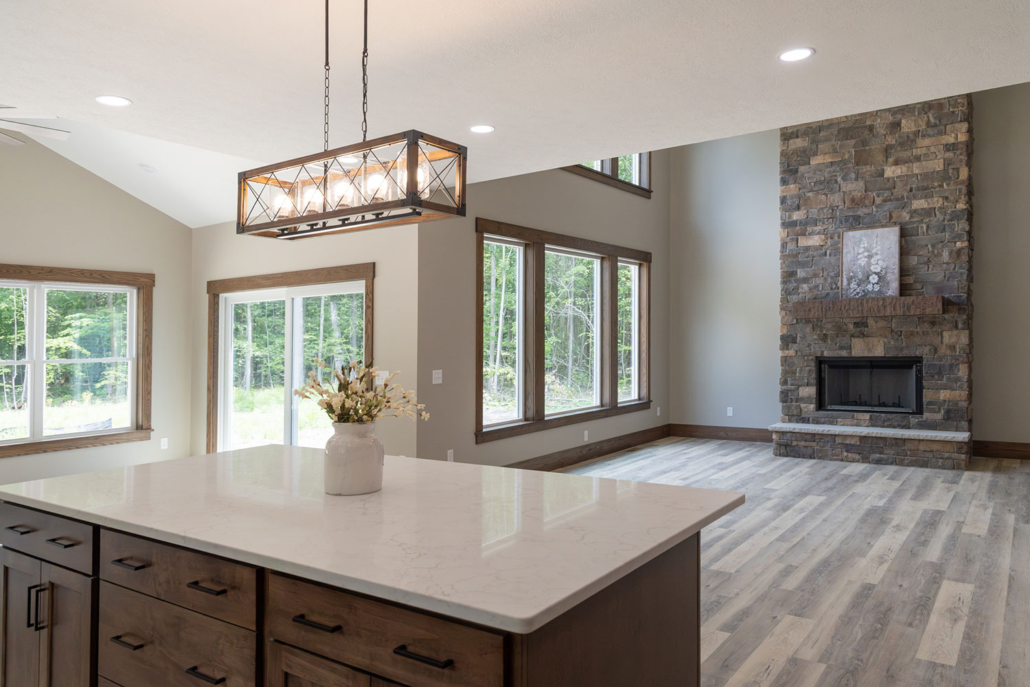Set against a peaceful wooded backdrop, this four-bedroom, two-and-a-half-bath home blends timeless character with bright, open living. 