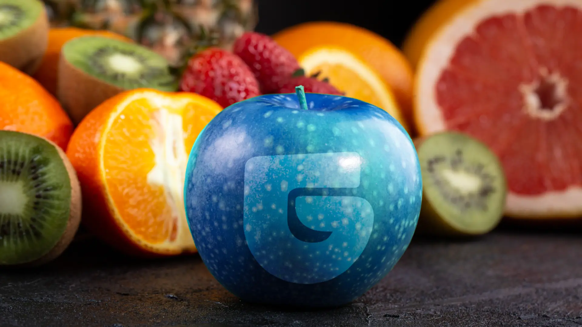 Blue apple in front of assorted fruits, symbolizing Grip Security's innovative approach to SaaS security solutions.