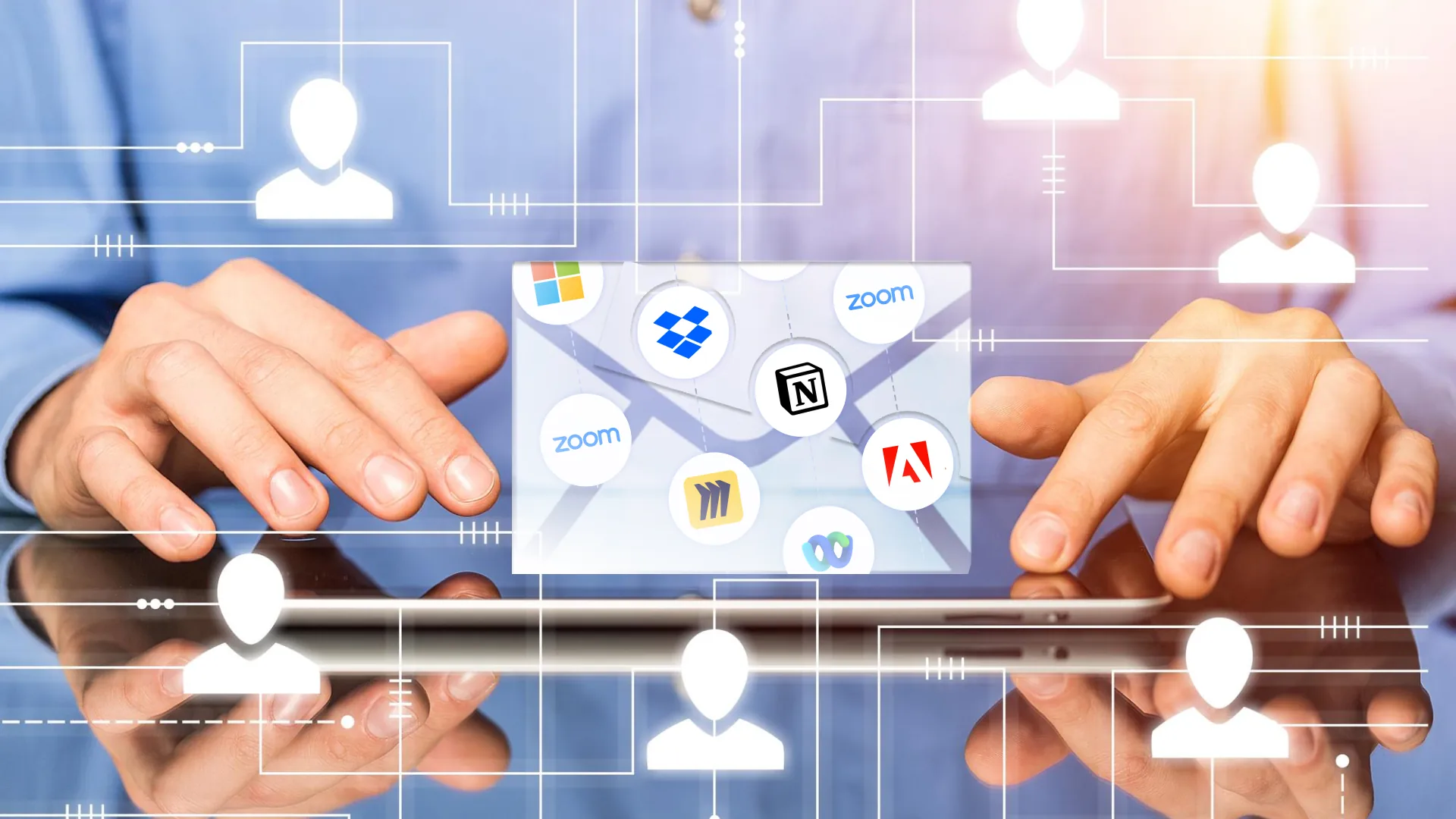 Hands interacting with a tablet displaying SaaS application icons, emphasizing cybersecurity and collaboration tools.