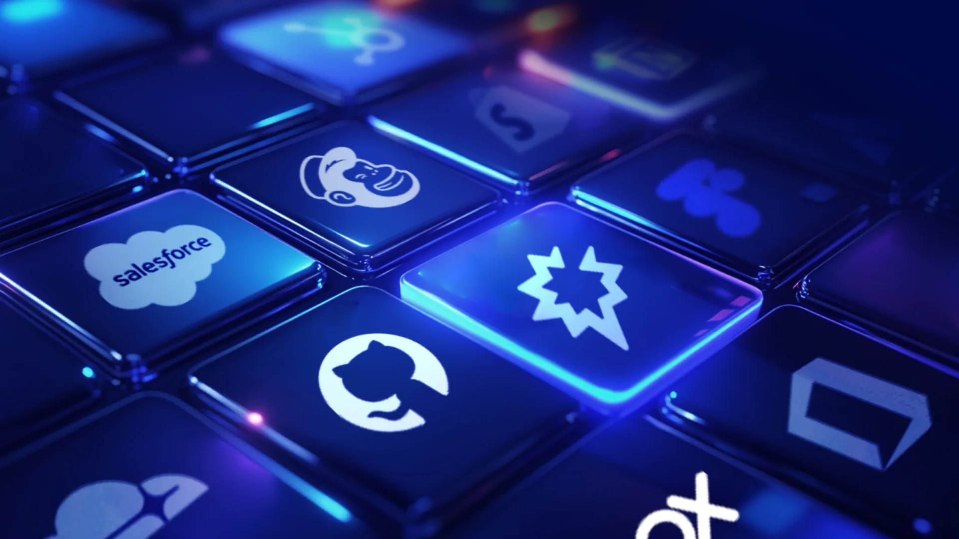 Colorful keyboard with icons representing various SaaS platforms, highlighting cybersecurity and integration tools.