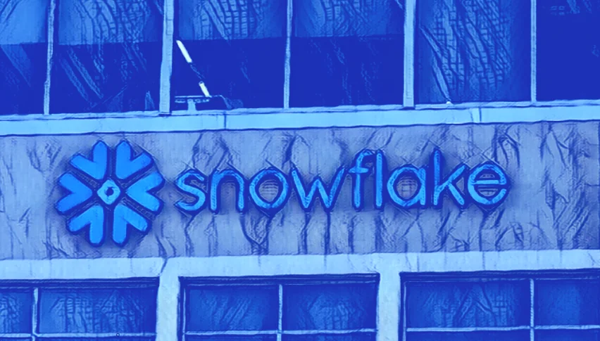 Snowflake logo displayed on a building, representing cloud data platform solutions relevant to SaaS security.