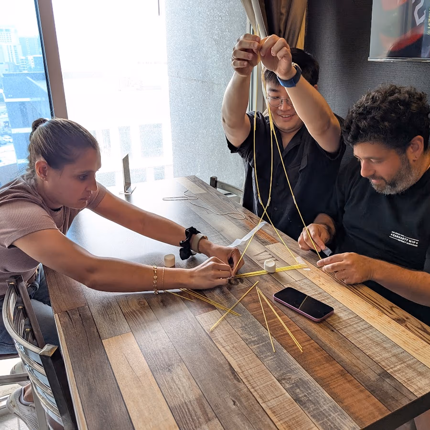 The Summer team working on a project