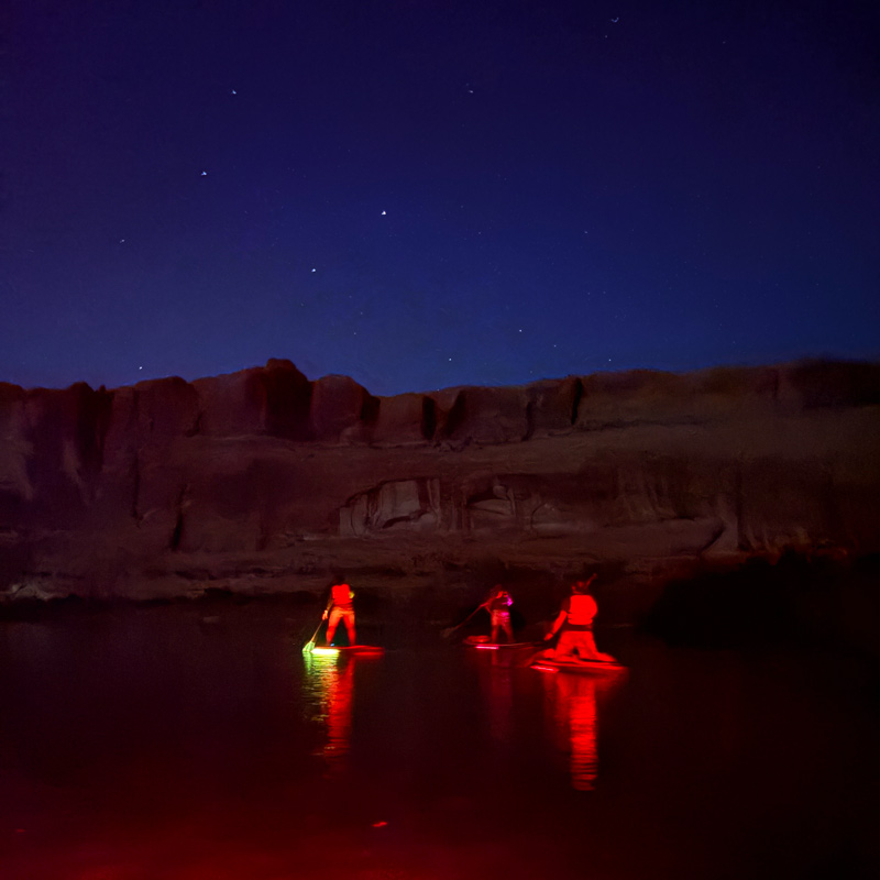 paddleboarding at night
