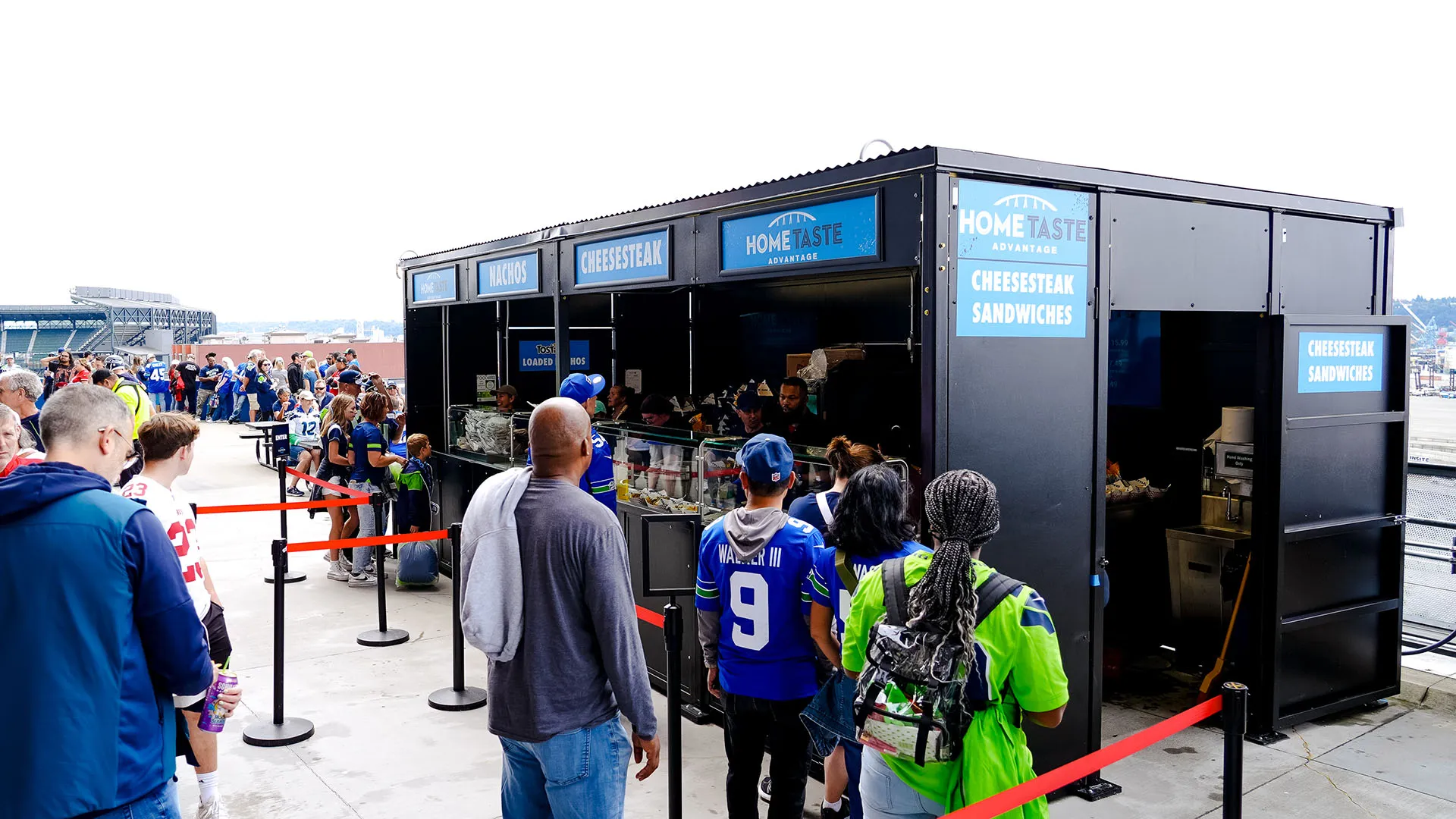 Two people using just walk out terminals