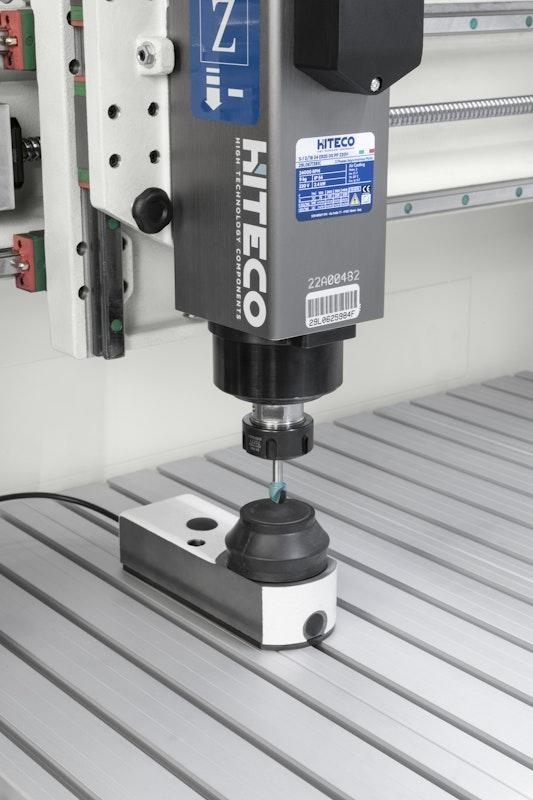 Afbeelding met machine, tekst, Huishoudelijk apparaat, overdektAutomatisch gegenereerde beschrijving