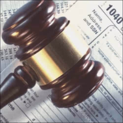 Gavel on tax forms