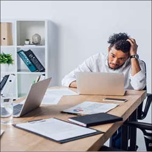 Man looking at Laptop