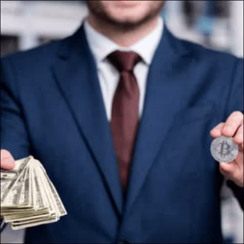 Man holding cash and bitcoin