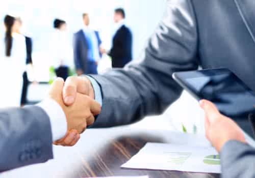 Business people shaking hands in an office