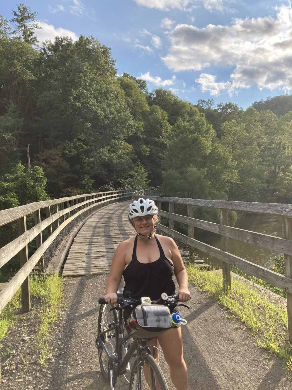 Woman riding bike on NRV trail
