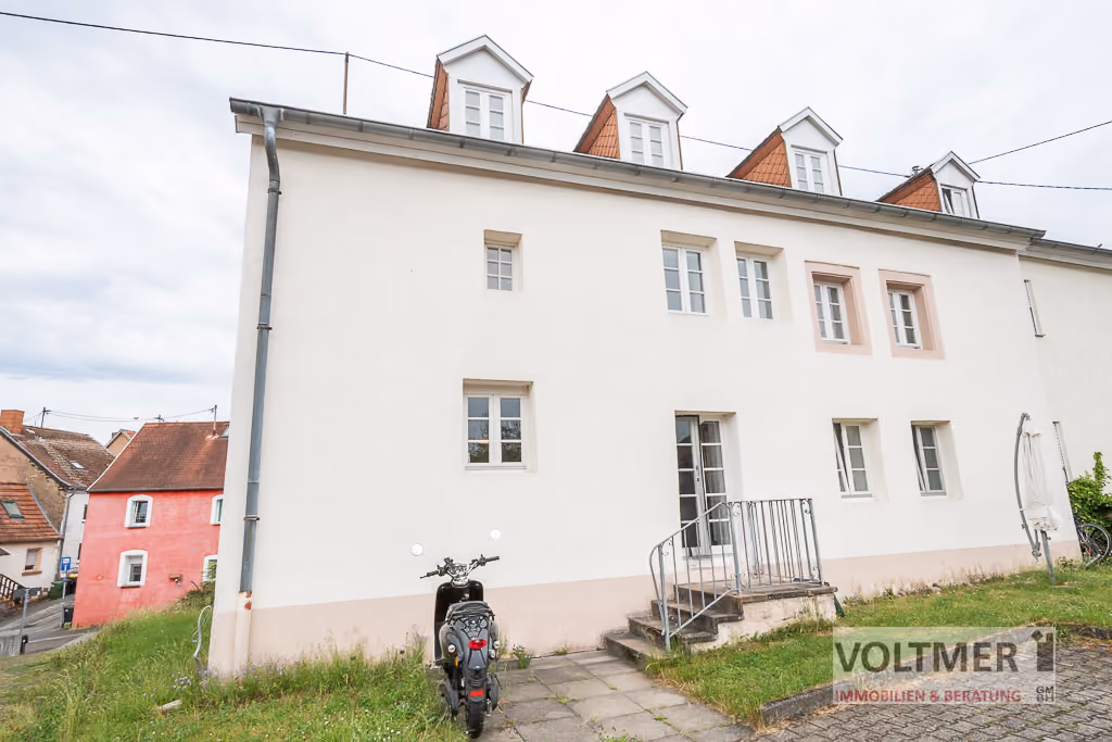 INVESTMENT - vermietete Eigentumswohnung mit Stellplatz in Dudweiler!