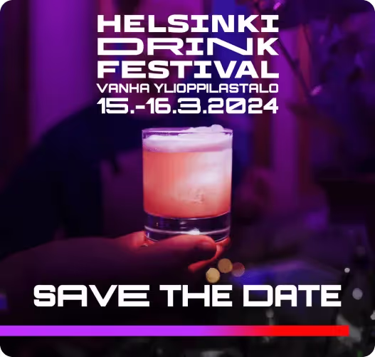 A person holding a drink in their hand