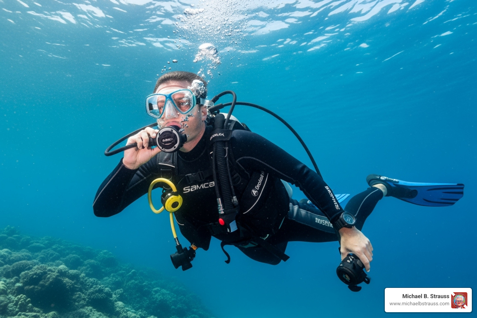 A diver demonstrating the use of an integrated alternate air source by breathing from the BCD inflator mechanism. - alternate air source