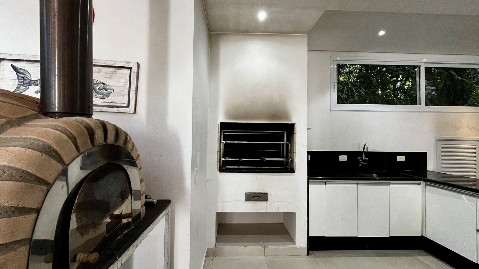 Forno a lenha e churrasqueira